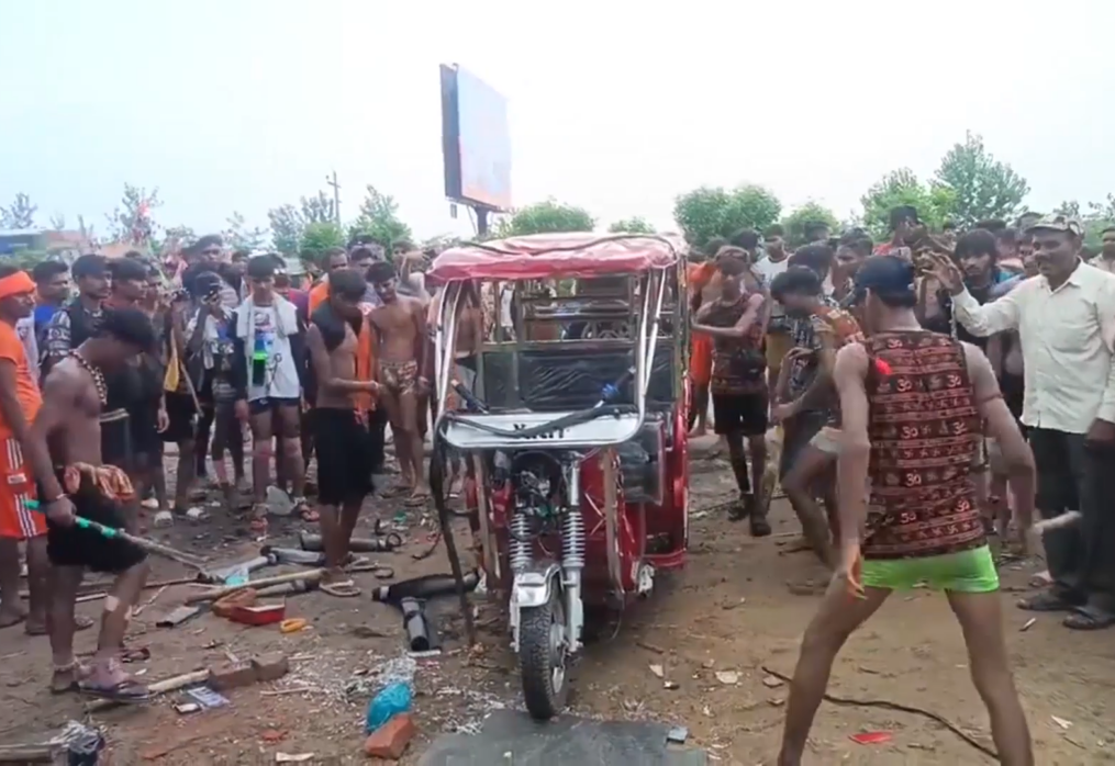 Pilgrims clash with police vandalizing e-rickshaw in northern India during annual religious festival